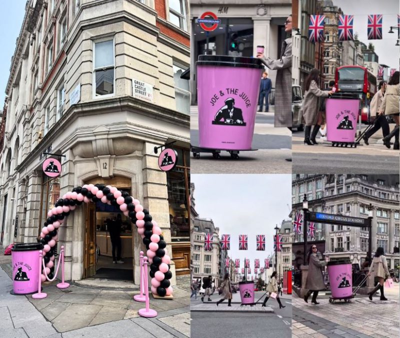 Joe and The Juice new store opening on Portland Street London. Giant pink branded cup designed and manufactured by Three Point, sitting outside the store promoting the Joe and The Juice brand