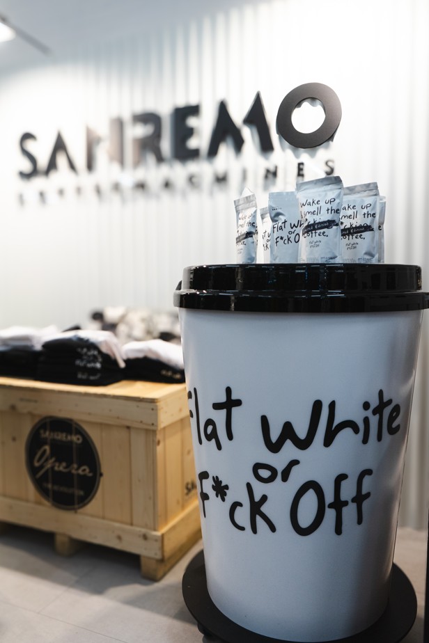 Flat White or F*ck Off with Ask The Impossible at the London Coffee Festival giant coffee cup by Three Point