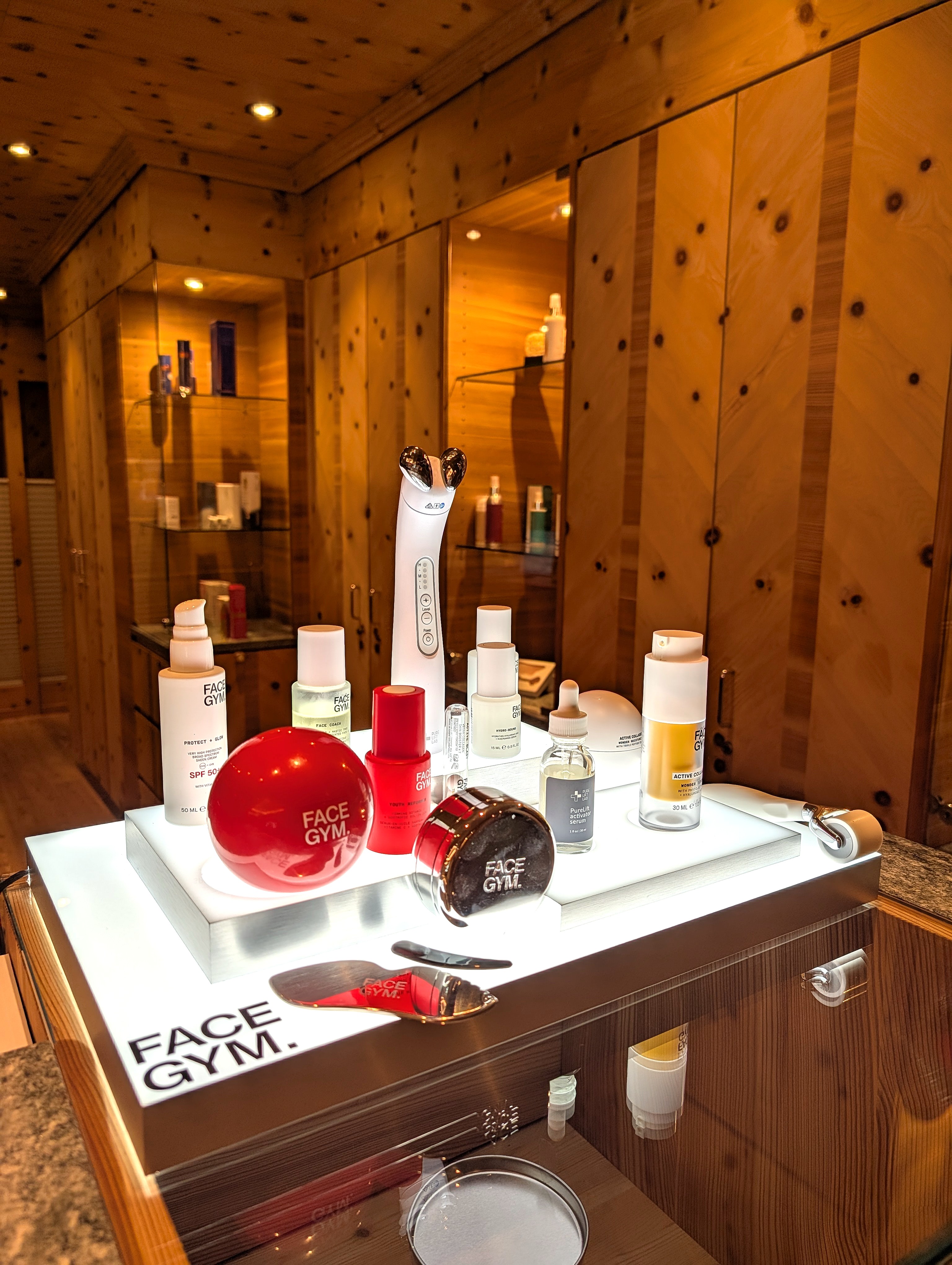 Facegym illuminated bespoke counter display unit at Kulm Hotel St.Moritz Switzerland spa by Three Point