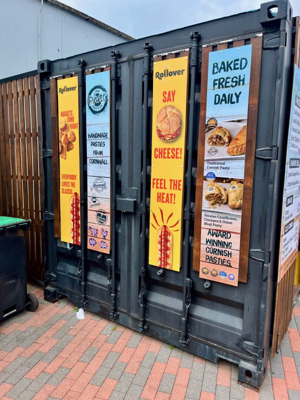 Image of multiple point of sale posters for Rollover at Gordano Services 