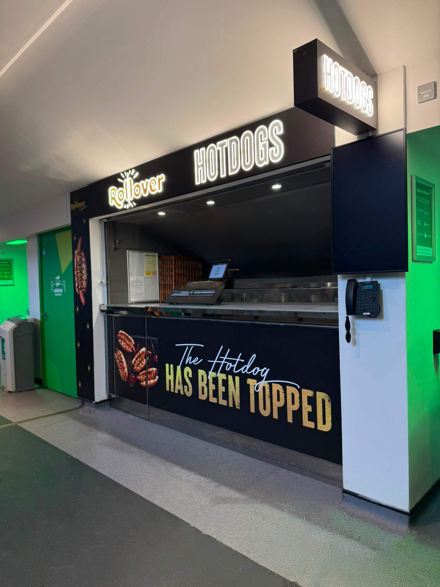 Rollover Wembley Neon Signs fit out by Three Point