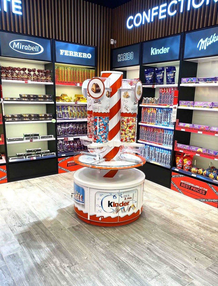Kinder-travel-retail-airport-confectionary-dispenser-unit-by-three-point