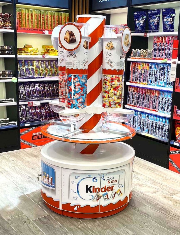 Kinder-travel-retail-airport-confectionary-dispenser-unit-by-three-point2
