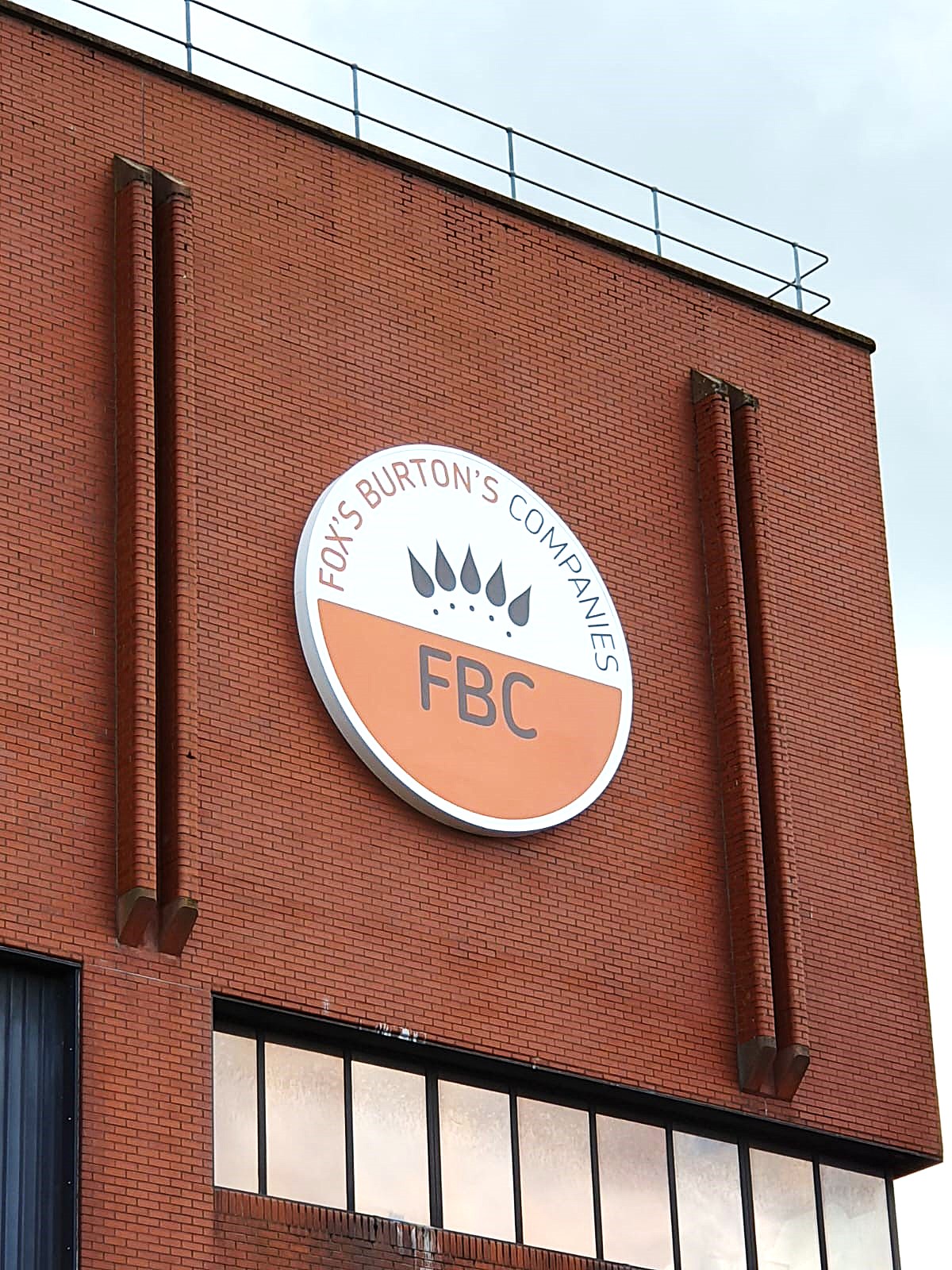 Fox's Burtons Foods illuminage sign design made and installed by Three Point
