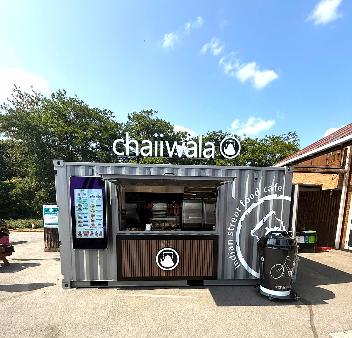Chaiiwala opens new road service station pop up actvation. Giant cup bin designed and made by Three Point