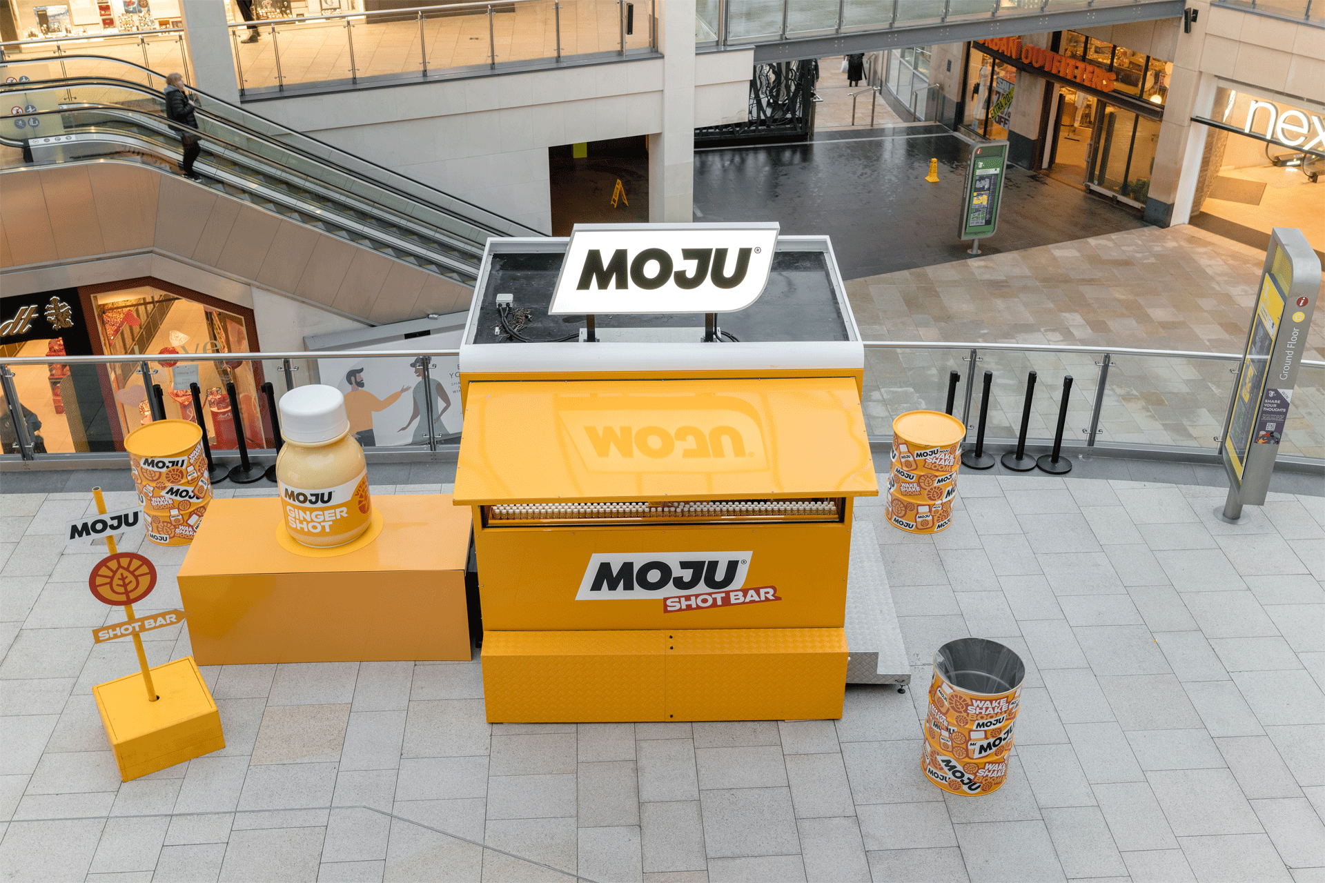Moju shot bar on tour around the UK - giant bottle factice designed and made by Three Point